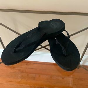 Two pairs of women’s Reef sandals size 10